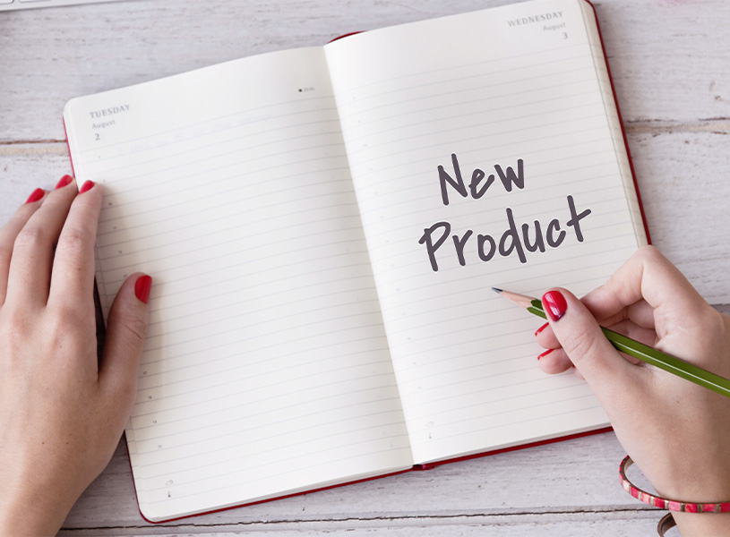 New Productと書かれたノート