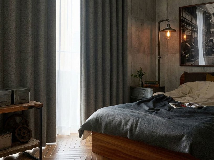 インダストリアルなインテリアに似合う完全遮光カーテンを使った寝室